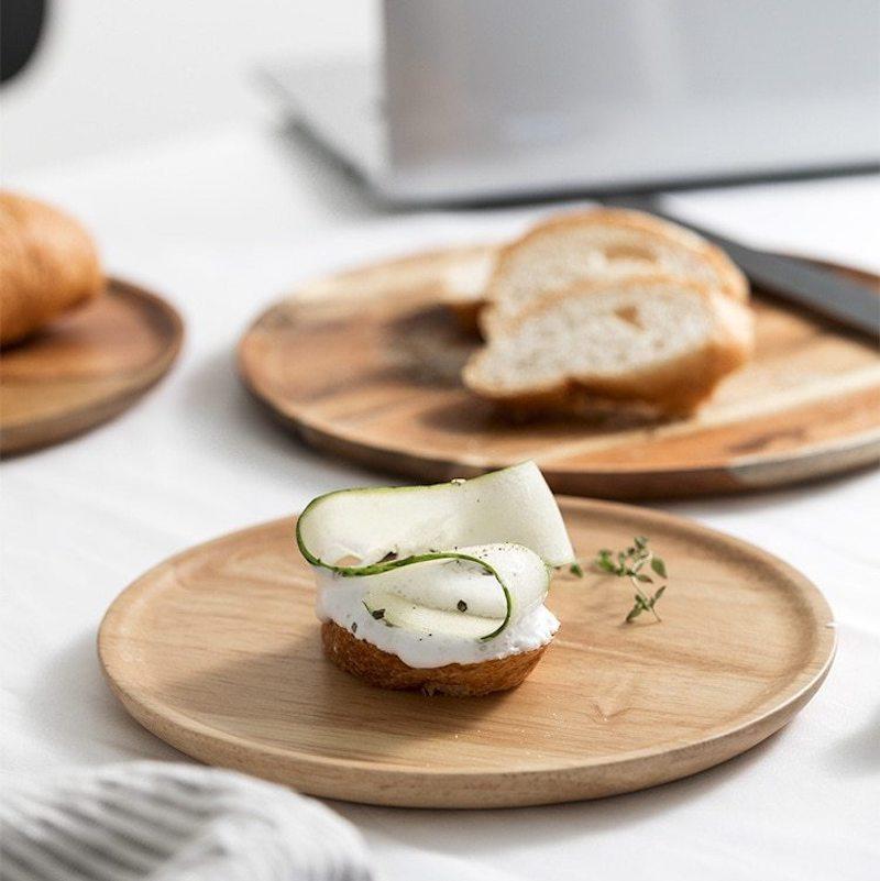 acacia wooden plates with bread